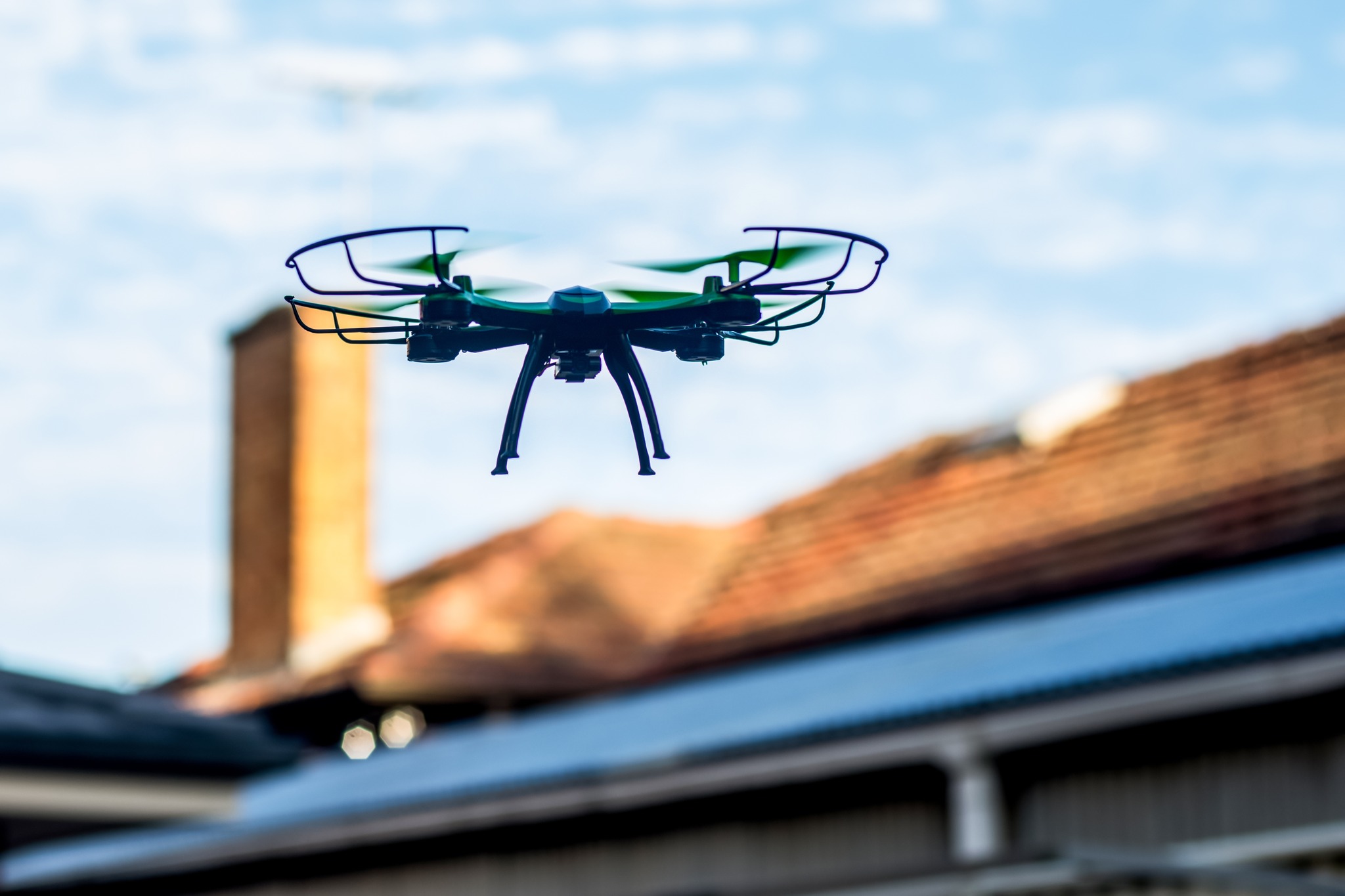 Drone performing a roof survey