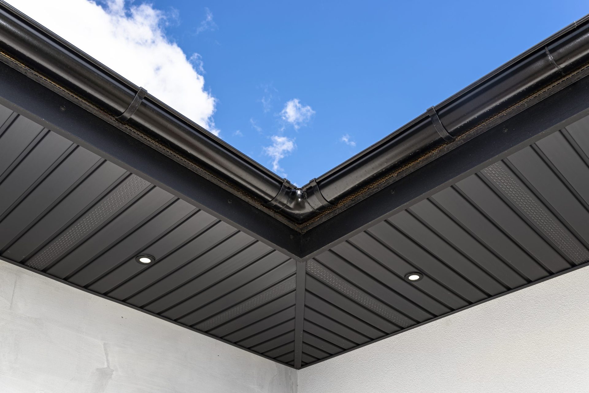 Modern graphite roof lining fixed to roof trusses