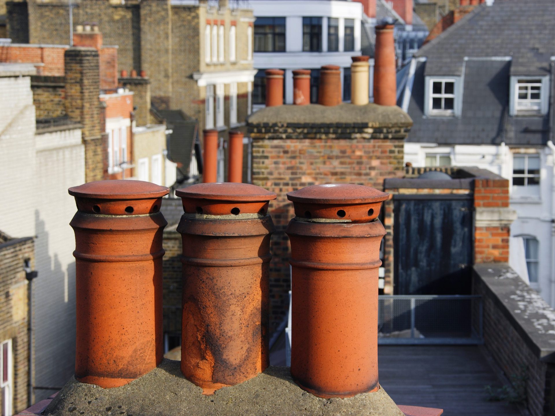 Chimney stacks on a row of rooftops