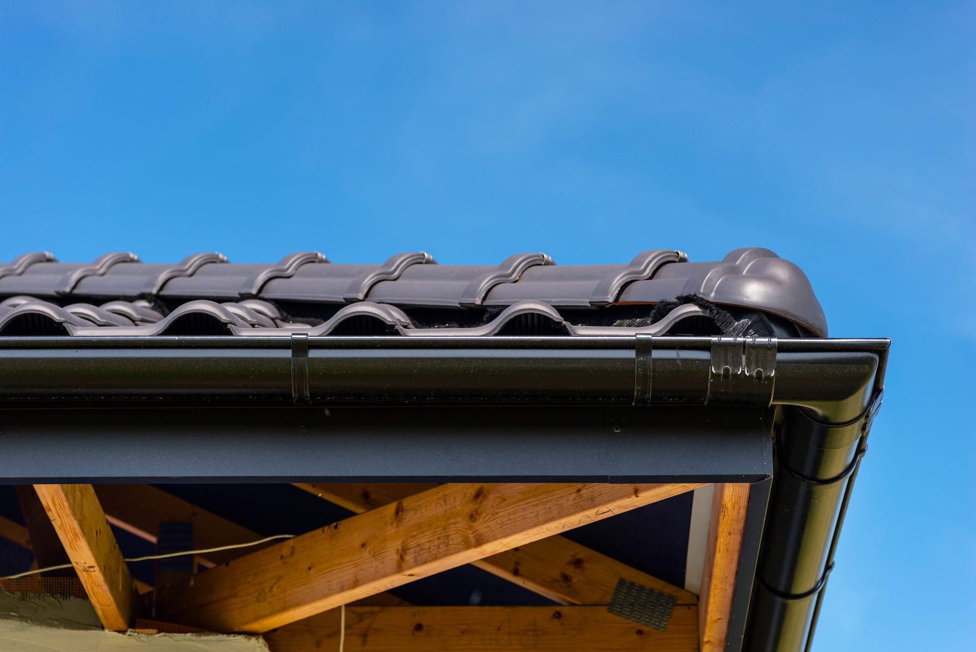 New ceramic tiled roof with visible ridge tiles
